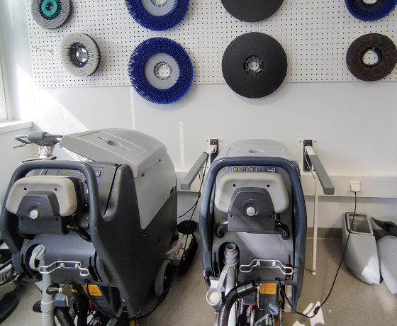 Janitorial warehouse with equipment, floor pads
